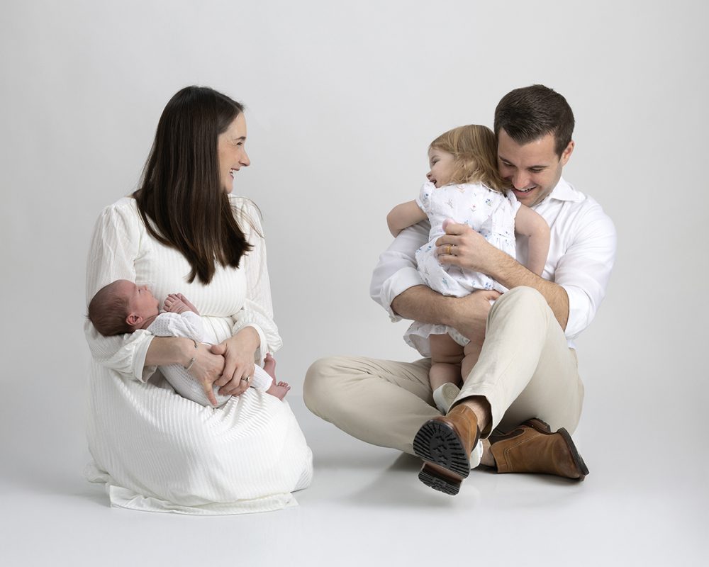 newborn family photographer sudbury ma studio family embrace
