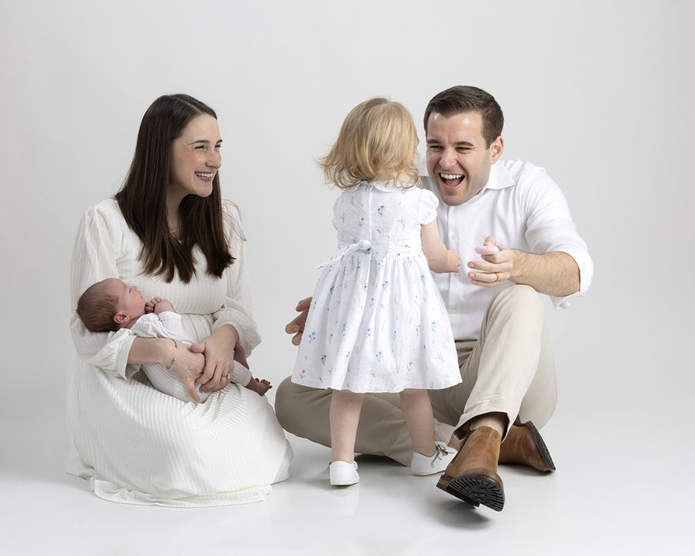 newborn family photographer sudbury ma studio sibling meeting baby
