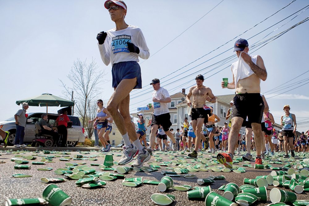 05 exhausted runner wiping face heat
