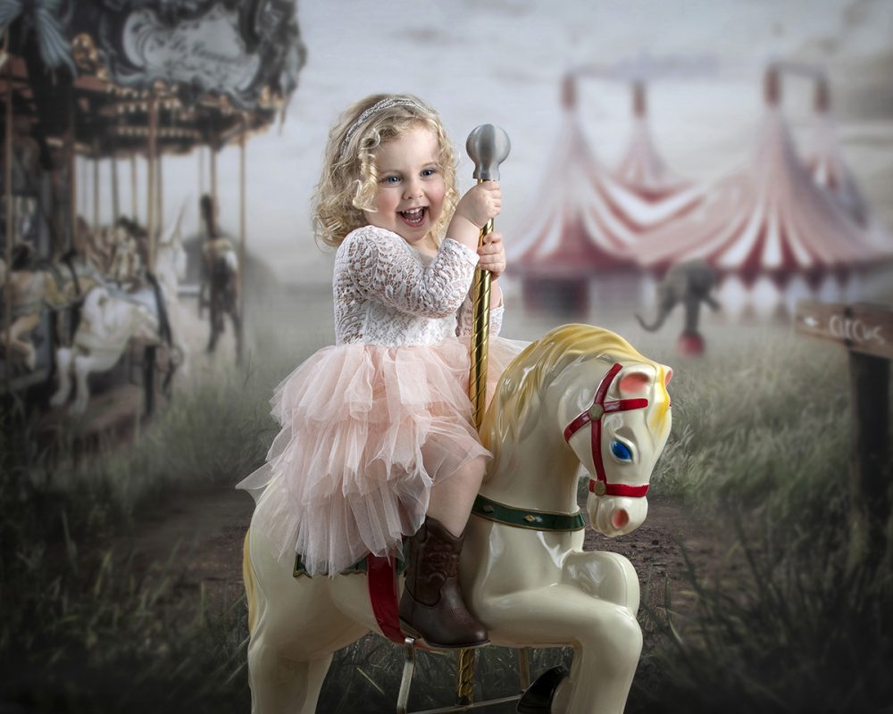 children photographer sudbury ma carnival mini session carousel portrait