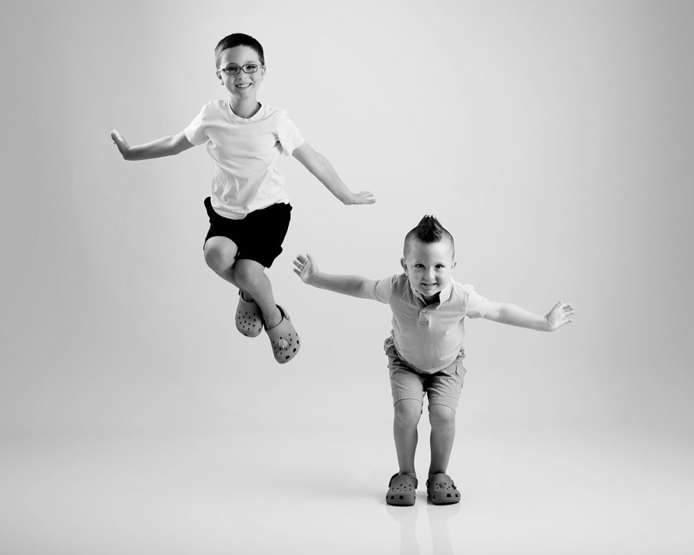 children photographer sudbury ma studio playful boys portrait