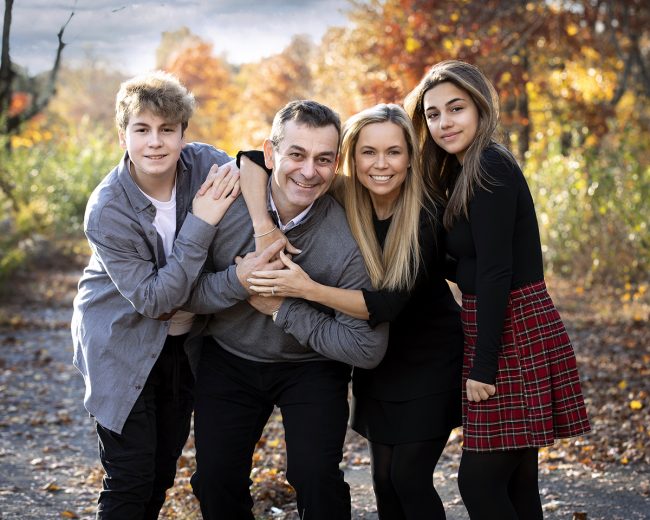 Outdoor fall family portrait photographed in the Boston Metrowest area by Paula Swift Photography