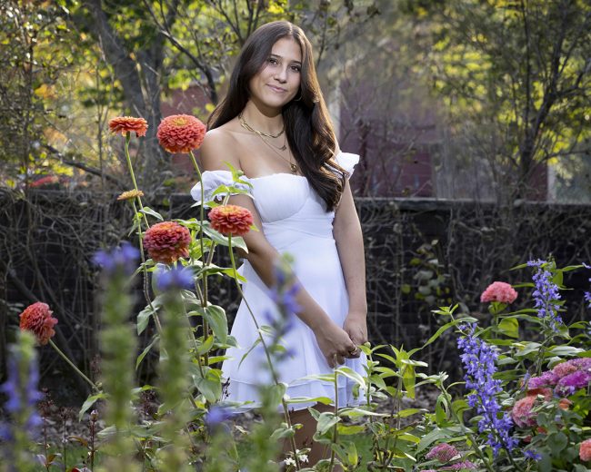 High school senior portrait photographed outdoors in Sudbury, Massachusetts by Paula Swift Photography